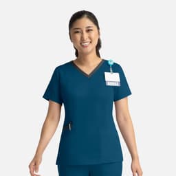 A teal women's double V-neck top with short sleeves, featuring a logo and a pocket.