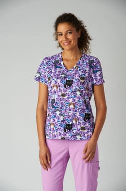 A purple patterned T-shirt featuring cats, worn by a model. The shirt has a V-neck design and short sleeves.