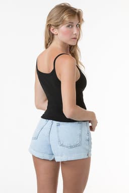 A sleek black spaghetti tank top featuring thin straps, paired with light blue denim shorts.