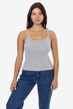 A grey spaghetti tank top featuring thin straps, displayed on a model paired with blue jeans.