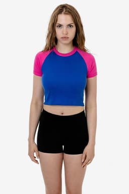 A short sleeve baby rib raglan tee featuring a blue body and pink sleeves, displayed on a model.