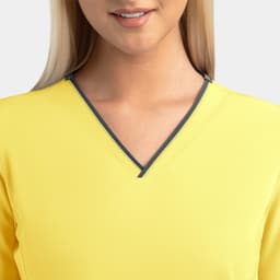 A yellow women's V-neck top with a contrasting grey trim and a logo on the neckline.