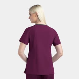 A women's contrast V-neck top in burgundy, featuring a short-sleeve design and a branding logo.
