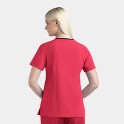 A women's v-neck top in bright red with short sleeves and a contrasting neckline, featuring a logo on the back.
