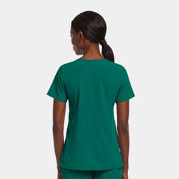 A women's mock wrap top in deep green, featuring a back design and a logo.