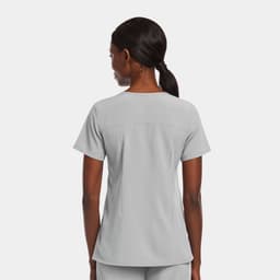 A grey women's mock wrap top, featuring a short sleeve design and a fitted silhouette, with branding on the garment.