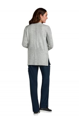 A grey Kori Sweater viewed from the back, paired with navy pants and featuring a logo.