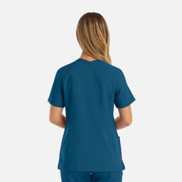 A women's double V-neck top in a teal colour, featuring short sleeves and a relaxed fit. It has a logo on the garment.
