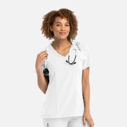 A white mock wrap top worn by a woman, featuring a V-neck and a stethoscope around her neck.