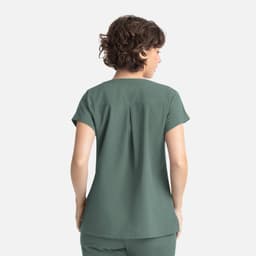 A women's top in a muted green colour with short sleeves and a simple back design, featuring a logo.