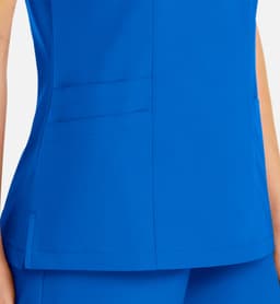 A vibrant blue women's mock wrap top featuring contrast trim and side pockets. The fabric appears smooth and professional.
