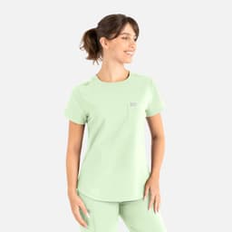 A light green round neck top designed for uniforms, featuring a pocket and decorative buttons. It includes a logo.