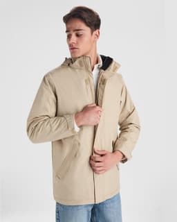 A beige parka jacket with a hood, featuring a front zip and side pockets, displayed on a model.