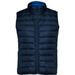 A women's padded vest in navy blue with a zip front and a quilted design. Features a contrasting blue interior and a logo.