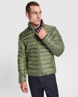 A waterproof jacket in olive green, featuring a puffy design and a high collar, worn by a model.