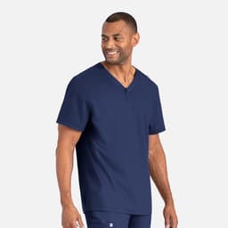 A navy men's tuckable henley top with short sleeves, featuring a buttoned neckline and a logo on the side.