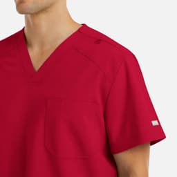 A red men's V-neck top featuring a chest pocket and a logo on the sleeve.