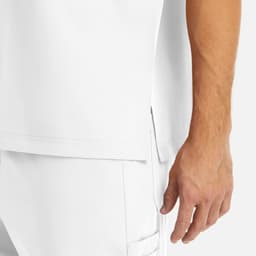 A white men's tuckable V-neck top featuring side slits and a hand on the fabric, showcasing a smooth texture.