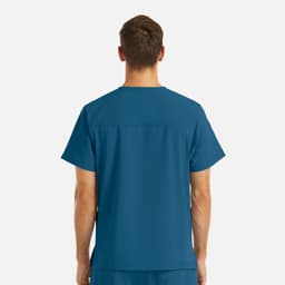 A teal V-neck top with a four-pocket design, displayed from the back. The top features a logo.