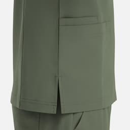 A green V-neck top featuring four pockets, with a side slits detail for added style.