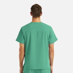 A green V-neck top with four pockets, featuring a logo, viewed from the back.