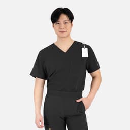 A men's V-neck top in black with contrast piping and a chest pocket, featuring a tag attached.