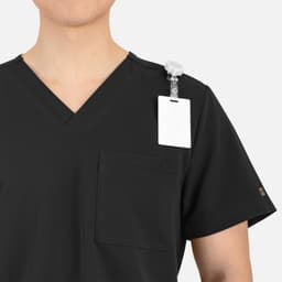 A black men's V-neck top featuring contrast piping and a pocket, with a badge holder on the shoulder.