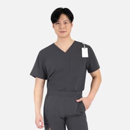 A plain grey men's V-neck top featuring short sleeves and a chest pocket, with a tag attached.