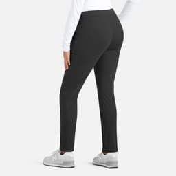 A pair of mid-rise tapered pants in black, featuring a fitted style and designed for women. The product has a logo.