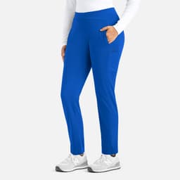 A pair of women's mid-rise tapered pants in bright blue, featuring side pockets and a fitted design.
