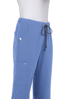 A pair of blue pants with a drawstring waist and side pockets, displayed on a mannequin.