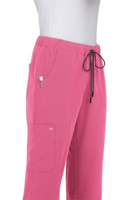 A pair of pink pants with pockets and a drawstring waist, featuring a logo on the side.