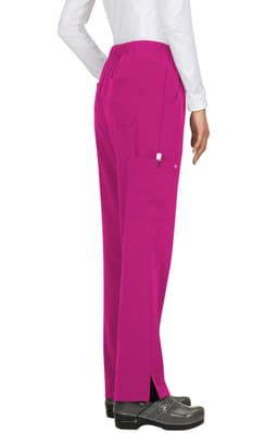 A pair of bright pink pants with a relaxed fit and side pockets, displayed on a model.