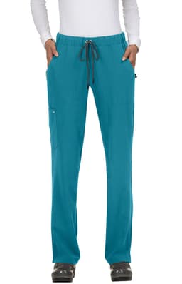 Teal pants with a drawstring waist, featuring pockets and a logo on the side, worn by a model.
