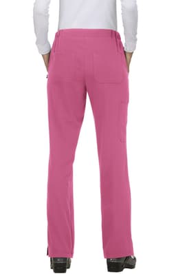 A pair of pink pants with multiple pockets, viewed from the back, worn by a person in a white top.
