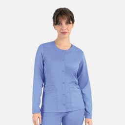 A round neck snap jacket in light blue, featuring long sleeves and front pockets, with a logo present.