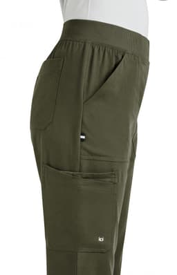 A pair of olive green boot cut pants with multiple pockets and an elastic waistband, featuring a small logo.