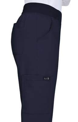 A pair of navy pants featuring a stretchy waistband and side pockets, with a logo on the side.