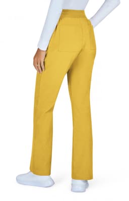 A pair of yellow pants with a flared design, featuring back pockets, displayed on a model wearing a white top.