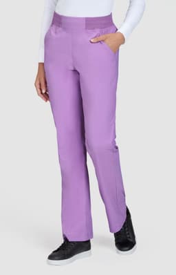 A pair of purple pants with a fitted waist and side pockets, worn by a woman. Features a logo on the garment.