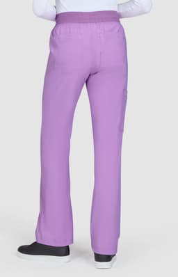 A pair of lilac pants with a relaxed fit and pockets, viewed from the back. The pants feature an elastic waistband.