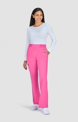 A pair of bright pink pants with a relaxed fit, styled with a light blue long-sleeve top.