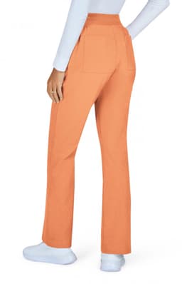 An orange pair of Wrenlee Pants is displayed, with a model showing the back view. The pants feature pockets.