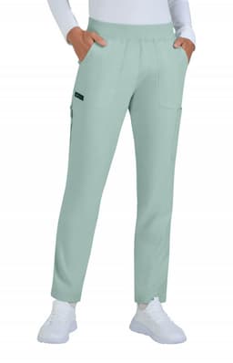 A pair of limited edition Harper pants in a soft mint green, featuring pockets and an elastic waistband.
