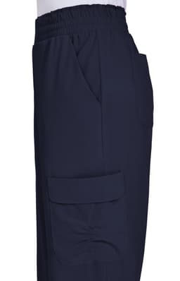 Ayla Pant in navy, featuring an elastic waistband and side pockets. The design includes a cargo pocket on the leg.