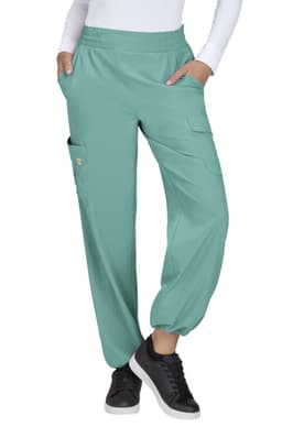 Ayla Pant in a light teal colour, featuring a relaxed fit, elastic waistband, and pockets on the sides.