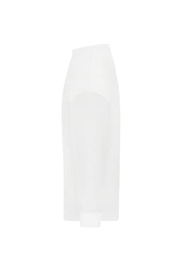 An oversized white jumper with long sleeves and a relaxed fit, featuring a logo on the side.