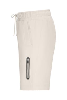 Men's interlock sports shorts in light beige, featuring a zipped pocket and an elastic waistband.