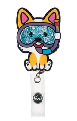 A colourful snorkelling corgi badge featuring sparkly blue elements and a white clip, with a logo on the base.