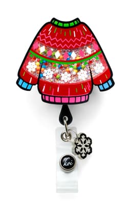 A red festive sweater badge featuring multicoloured sequins and a snowflake charm, with a logo at the bottom.